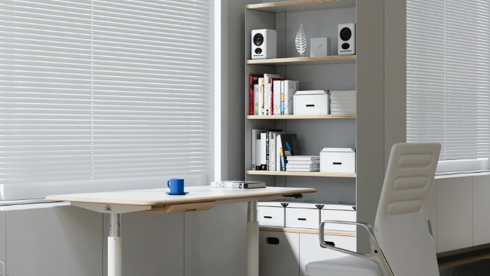 Custom white horizontal blinds on home office windows, providing adjustable light control, privacy, and a clean, modern look for an everyday workspace.